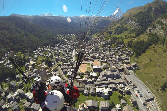 20 to 25 Minute Tandem Paragliding in Zermatt and Matterhorn View - Landing near Zermatt, plus the Victory Beer moment