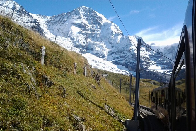 Alpine Majesty:From Zürich to Jungfraujoch Exclusive Private Tour - The return route: cogwheel descent, Kleine Scheidegg, and the Lauterbrunnen waterfall view