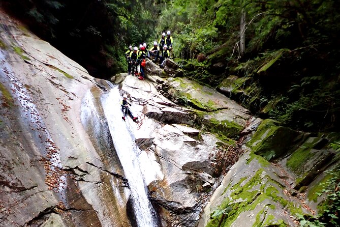 Basic Corippo Canyoning Experience in Valle Verzasca - The last slide into Lake Vogorno: the payoff