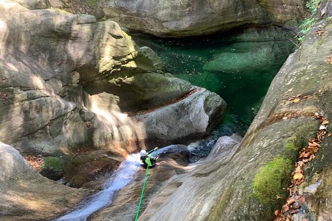 Basic Corippo Canyoning Experience in Valle Verzasca - Gear, harnesses, helmets, and the free action photos
