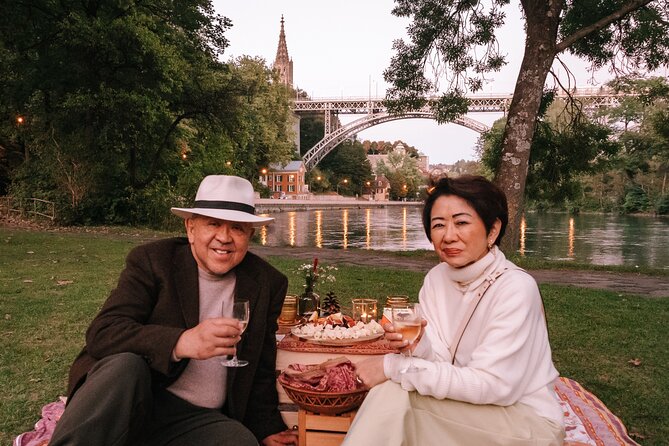 Bern Private Photoshoot with Optional Picnic by the River - Dalmazimätteli Picnic: Swiss Cheese, Wine, Bread, and Chocolate