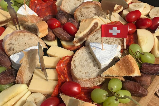 Cheese platter by Boat on Lake Thun, Interlaken - Skip the Bars, Start Your Evening in Unterseen