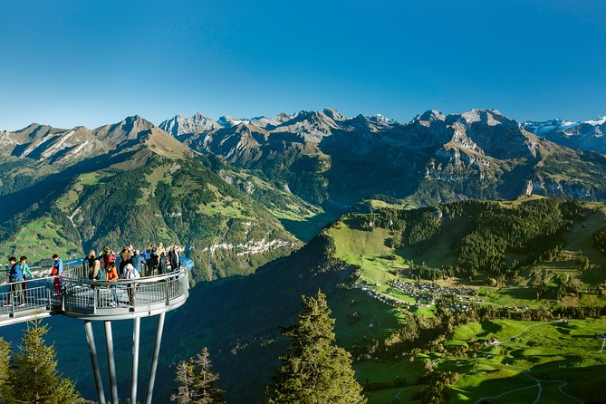 Day Trip to Lucerne and Mount Stanserhorn Including CabriO Cable Car Ride - Stans funicular: the restored 1893 ride through meadows and valleys
