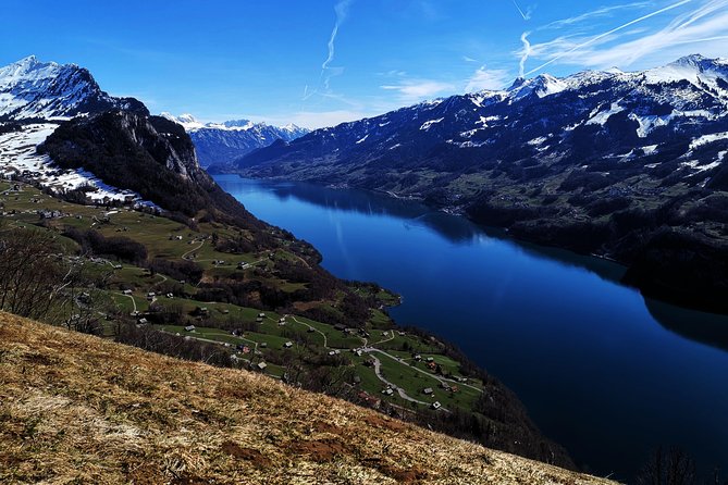 From Zurich: Breathtaking waterfall and lakes private tour - UNESCO Sardona in Linthal: walking behind a waterfall