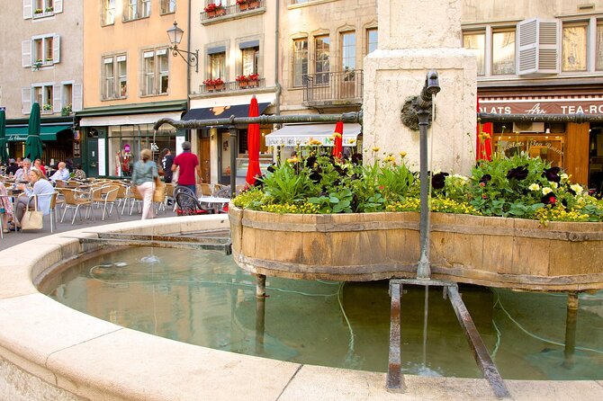 Geneva: Sightseeing of top Places Tour Electric TukTuk 1H15 tour - St. Pierre Cathedral: 157 steps to a 360-degree view payoff