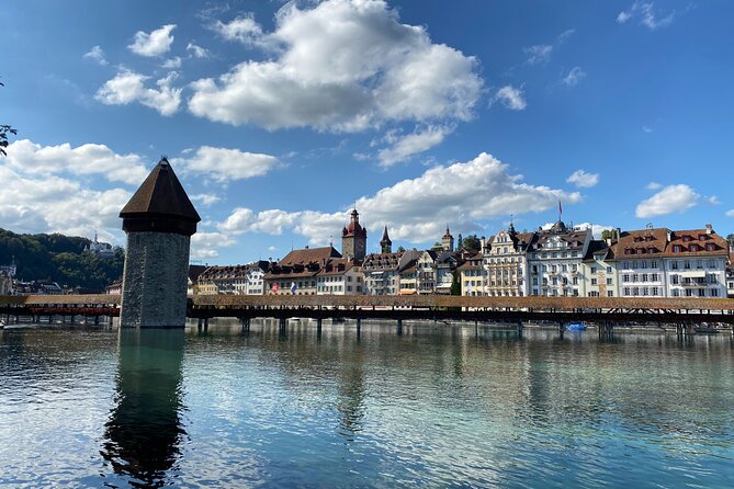 Glacier Express, Swiss Alps & Lucerne Tour | From Lucerne - Lucerne Old Town walk: Chapel Bridge and Lion Monument, explained