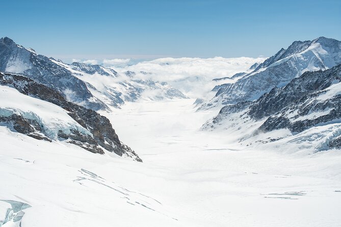 Jungfraujoch Top of Europe Day Trip from Interlaken - Jungfraujoch summit time: a ticketed guided discovery, not just an elevator ride