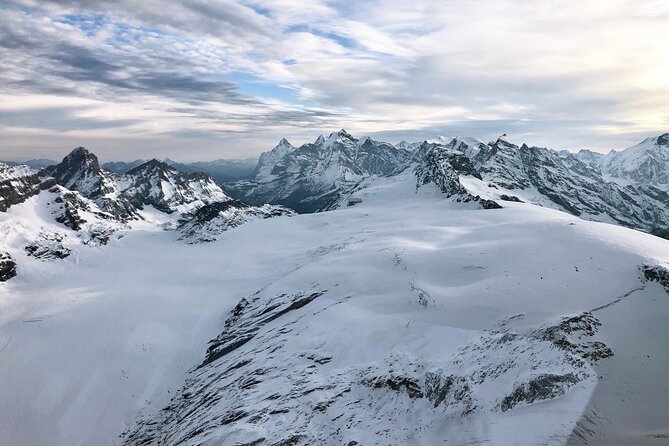 Matterhorn helicopter tour - longest scenic flight from Bern over the Swiss Alps - Oeschinensee and Lake Thun: When Turquoise Looks Almost Too Perfect