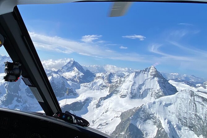 Matterhorn helicopter tour - longest scenic flight from Bern over the Swiss Alps - Sion, the Rhone Valley Walls, and the Breithor Ice Near the Summit