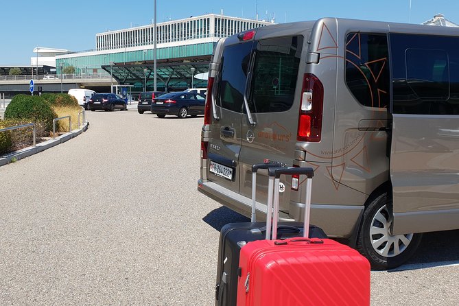 Private Arrival Transfer: from Geneva Airport to Geneva City - Inside the vehicle: air-conditioning, Wi-Fi, water, and comfort