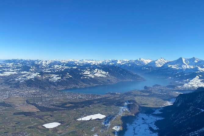 Private helicopter flight to Stockhorn mountain, with view to the Swiss Alps - Catching Eiger, Mönch, and Jungfrau in one flight window