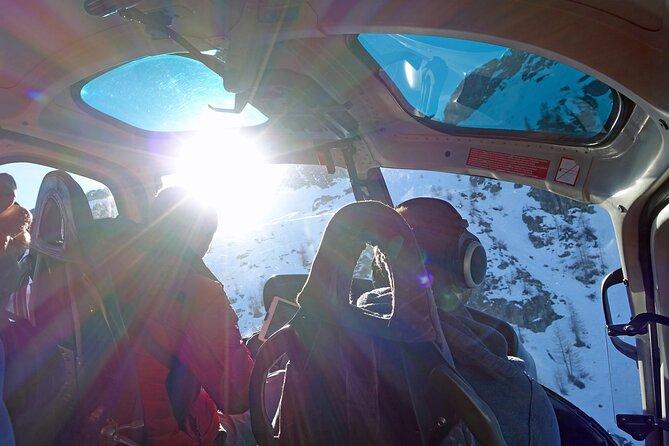 Private helicopter flight to Stockhorn mountain, with view to the Swiss Alps - Emmental farmland cues: Langnau and the cheese connection