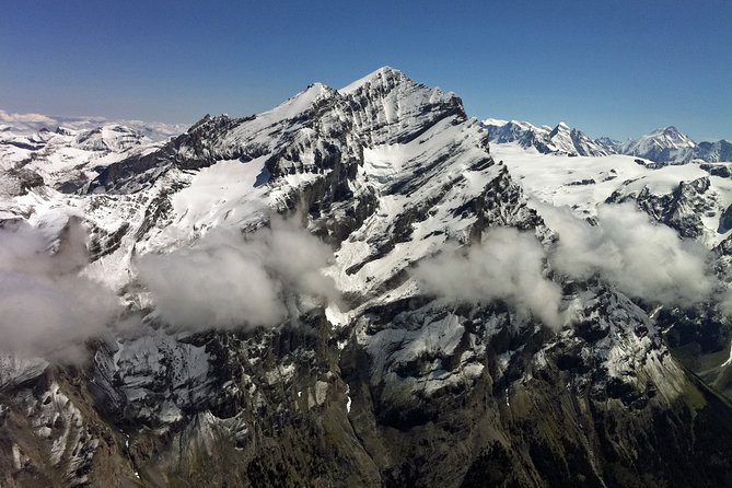 Private Swiss Alps helicopter tour over snow covered mountain peaks and glaciers - Interlaken From Above: Two Lakes, One Bird’s-Eye Story