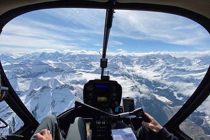 Private Swiss Alps helicopter tour over snow covered mountain peaks and glaciers - Lake Thun’s Turquoise Water, and the Glacier Connection