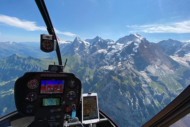 Private Swiss Alps helicopter tour over snow covered mountain peaks and glaciers - Lake Brienz: Cold, Clear Clues and Steep-Walled Views