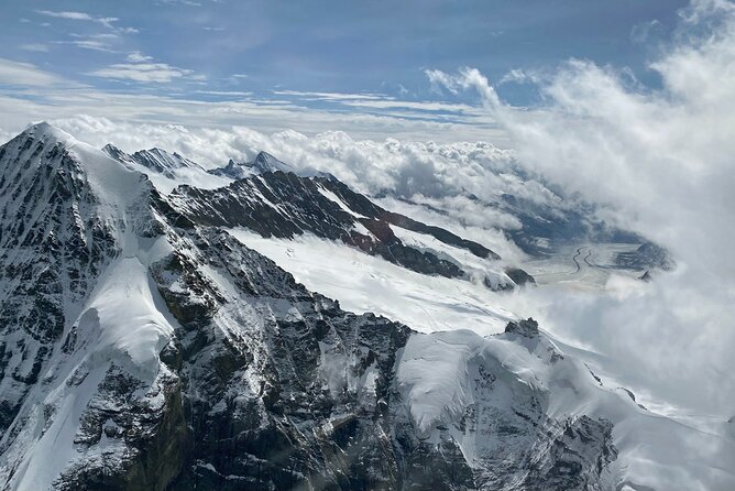 Private Swiss Alps helicopter tour over snow covered mountain peaks and glaciers - Private Flight Comfort: Headsets, Windows, and What You Should Plan For