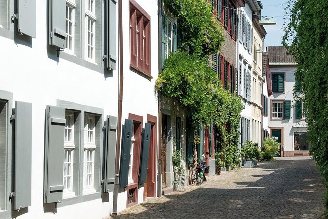 Stories of Basel's Old Town - Stop 3: Basler Münster, red sandstone towers and the Mittlere Brücke view