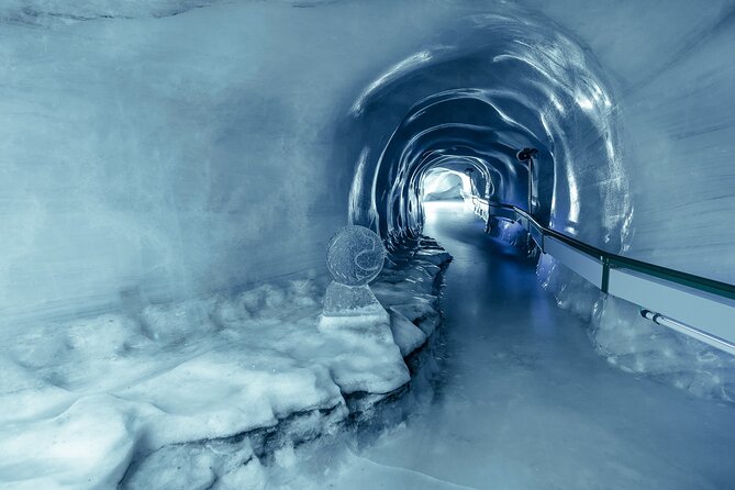 Titlis, the eternal snow mountain, and Lucerne Village - Titlis by Rotair revolving cable car: ice caves, Cliff Walk, and the view gamble