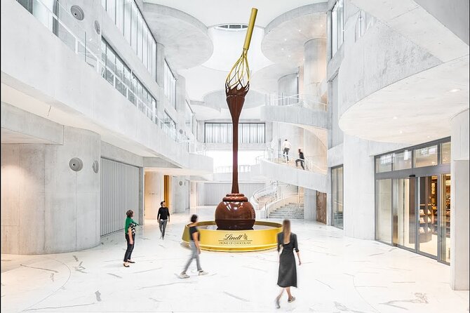 Tour in Lindt Home of Chocolate Museum From Zurich With pickup - The 9-Meter Fountain and the Production Line Views