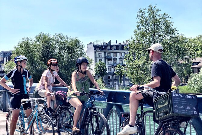 Urban Bike Tour Zurich - Bluntschlibrunnen and the lake promenade, with Alps views on the side